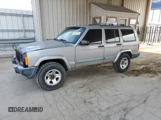 2000 Jeep Cherokee z VIN 1J4FF48S7YL221475, wystawiony jako Copart lot #53005275 z przebiegiem 273 246 mil mil oraz Tytuł czysty. Historia ofert i sprzedaży dostępna na DreamBid. Obrazek 1.
