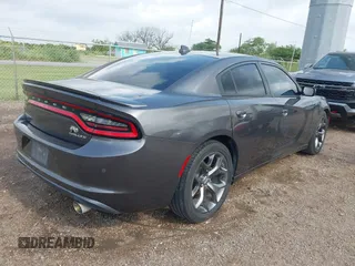 2015 Dodge Charger SXT with VIN 2C3CDXHG7FH886502, listed as a IAAI auction lot 42072027 with 105,034 mi miles and . Bid and sale history available at DreamBid. Image 4.