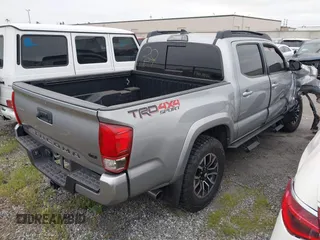 2017 Toyota Tacoma SR5 with VIN 3TMCZ5AN5HM074727, listed as a IAAI auction lot 41976419 with 102,600 mi miles. Bid and sale history available at carsss.com. Image 4.