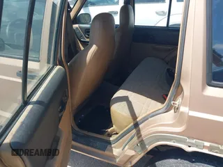 1999 Jeep Cherokee Sport with VIN 1J4FT68S1XL528885, listed as a IAAI auction lot 42536873 with Not provided miles and . Bid and sale history available at DreamBid. Image 8.