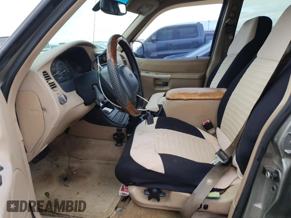 1999 Ford Explorer XL z VIN 1FMDU32E9XZB67958, wystawiony jako Copart lot #75350694 z przebiegiem 202 939 mil mil oraz Szkoda całkowita • Salvage title. Historia ofert i sprzedaży dostępna na DreamBid. Obrazek 7.