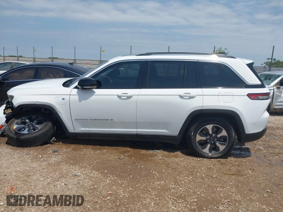 2023 Jeep Grand Cherokee with VIN 1C4RJYB63PC649000, listed as a IAAI auction lot 42306975 with 29,948 mi miles and . Bid and sale history available at DreamBid. Image 14.