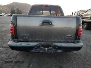 2002 Ford F-150 Harley Davidson with VIN 1FTRW07332KE10689, listed as a Copart auction lot 88341885 with 0 mi miles and Salvage Title. Bid and sale history available at carsss.com. Image 6.