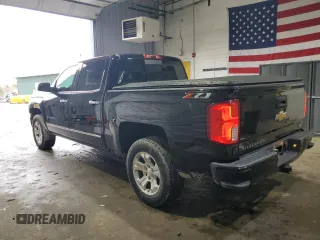 2018 Chevrolet Silverado 1500 LTZ with VIN 3GCUKSEC5JG357391, listed as a Copart auction lot 47824265 with 122,377 mi miles and Salvage Title. Bid and sale history available at DreamBid. Image 2.