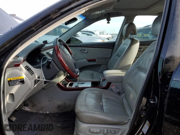 2007 Hyundai Azera SE z VIN KMHFC46F17A154947, wystawiony jako Copart lot #49224835 z przebiegiem 211 940 mil mil oraz Szkoda całkowita • Salvage title. Historia ofert i sprzedaży dostępna na DreamBid. Obrazek 7.