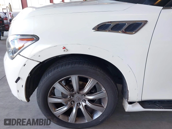 2012 Infiniti QX56 8-passenger with VIN JN8AZ2ND0C9715396, listed as a IAAI auction lot 41267602 with 206,630 mi miles and . Bid and sale history available at DreamBid. Image 6.