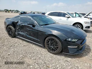 2018 Ford Mustang GT with VIN 1FA6P8CF9J5153412, listed as a Copart auction lot 57088015 with 67,031 mi miles and Salvage title. Bid and sale history available at DreamBid. Image 4.