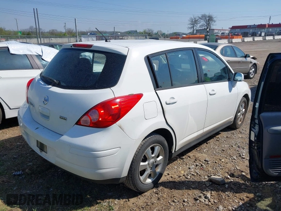 2012 Nissan Versa S with VIN 3N1BC1CPXCK212600, listed as a IAAI auction lot 41918424 with 104,483 mi miles. Bid and sale history available at carsss.com. Image 4.