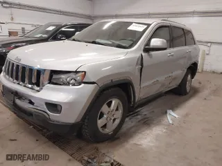 2011 Jeep Grand Cherokee Laredo with VIN 1J4RR4GG5BC690251, listed as a IAAI auction lot 41824839 with 261,010 mi miles. Bid and sale history available at carsss.com. Image 2.