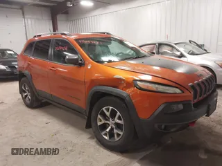 2015 Jeep Cherokee Trailhawk z VIN 1C4PJMBS7FW728650, wystawiony jako IAAI lot #42044221 z przebiegiem 174 329 mil mil oraz . Historia ofert i sprzedaży dostępna na DreamBid. Obrazek 1.