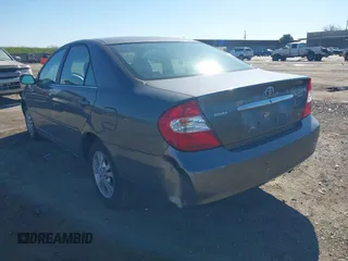 2004 Toyota Camry LE with VIN 4T1BF30K74U588368, listed as a IAAI auction lot 41659383 with 190,833 mi miles. Bid and sale history available at carsss.com. Image 3.