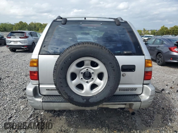 2000 Honda Passport LX with VIN 4S6CK58WXY4411135, listed as a Copart auction lot 71426994 with 214,051 mi miles and Salvage Title. Bid and sale history available at carsss.com. Image 6.