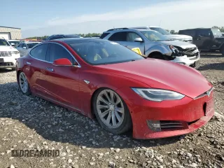 2016 Tesla Model S 70 with VIN 5YJSA1E1XGF153509, listed as a Copart auction lot 65047634 with 51,235 mi miles and Salvage Title. Bid and sale history available at carsss.com. Image 4.