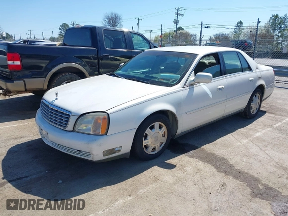 2004 Cadillac DeVille z VIN 1G6KD54Y74U129218, wystawiony jako IAAI lot #41786756 z przebiegiem 167 125 mil mil oraz . Historia ofert i sprzedaży dostępna na DreamBid. Obrazek 2.