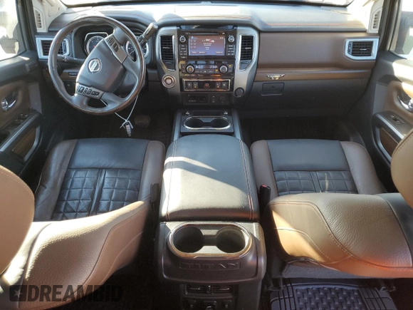 2016 Nissan Titan Platinum Reserve z VIN 1N6BA1F2XGN506885, wystawiony jako Copart lot #80171524 z przebiegiem 318 311 mil mil oraz Czysty tytuł • Clean title. Historia ofert i sprzedaży dostępna na DreamBid. Obrazek 8.