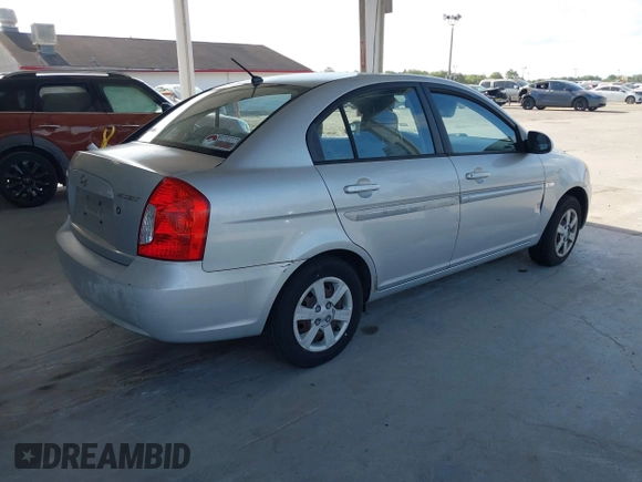 2007 Hyundai Accent GLS with VIN KMHCN46C27U138872, listed as a IAAI auction lot 42144670 with 81,260 mi miles. Bid and sale history available at carsss.com. Image 4.