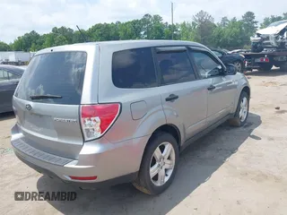 2009 Subaru Forester X with VIN JF2SH616X9H718811, listed as a IAAI auction lot 42446220 with 232,578 mi miles and . Bid and sale history available at DreamBid. Image 4.