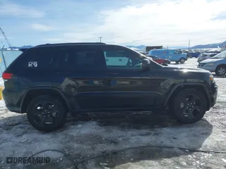 2019 Jeep Grand Cherokee Laredo E with VIN 1C4RJFAG9KC545246, listed as a IAAI auction lot 41478586 with 146,025 mi miles. Bid and sale history available at carsss.com. Image 13.