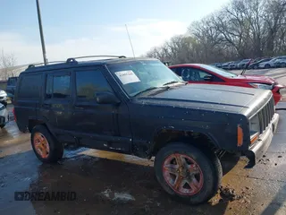 2000 Jeep Cherokee Classic with VIN 1J4FF58SXYL215871, listed as a IAAI auction lot 41855165 with 132,284 mi miles. Bid and sale history available at carsss.com. Image 13.