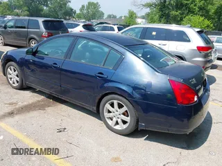 2004 Nissan Maxima SE with VIN 1N4BA41E04C903587, listed as a IAAI auction lot 42433154 with 213,535 mi miles and . Bid and sale history available at DreamBid. Image 3.