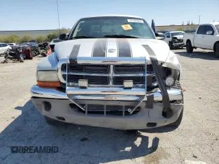 2004 Dodge Dakota SLT with VIN 1D7HG48N74S509797, listed as a Copart auction lot 57797055 with 214,275 mi miles and Salvage title. Bid and sale history available at DreamBid. Image 5.