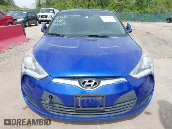 2014 Hyundai Veloster with VIN KMHTC6AD2EU184927, listed as a IAAI auction lot 42133499 with 103,499 mi miles. Bid and sale history available at carsss.com. Image 6.