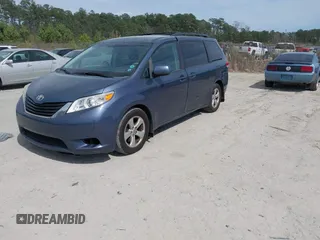 2014 Toyota Sienna LE AAS with VIN 5TDKK3DCXES498110, listed as a IAAI auction lot 41847116 with 242,065 mi miles and . Bid and sale history available at DreamBid. Image 2.