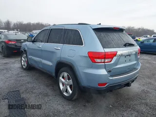 2013 Jeep Grand Cherokee Overland with VIN 1C4RJFCT2DC572978, listed as a IAAI auction lot 41468915 with 223,528 mi miles. Bid and sale history available at carsss.com. Image 3.