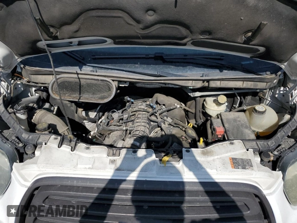 2015 Ford Transit with VIN 1FTNE2CG1FKA40998, listed as a Copart auction lot 60338605 with 77,895 mi miles and Salvage title. Bid and sale history available at DreamBid. Image 11.