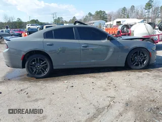 2019 Dodge Charger SXT with VIN 2C3CDXJG1KH537825, listed as a IAAI auction lot 41482387 with 71,062 mi miles and . Bid and sale history available at DreamBid. Image 12.