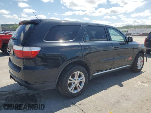 2013 Dodge Durango SXT with VIN 1C4RDJAG3DC575923, listed as a Copart auction lot 60100195 with 211,606 mi miles and Salvage title. Bid and sale history available at DreamBid. Image 3.