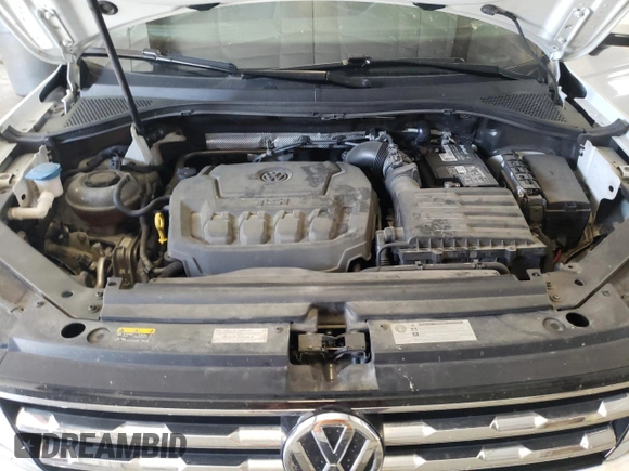 2018 Volkswagen Tiguan S with VIN 3VV1B7AX4JM118670, listed as a Copart auction lot 57055935 with 104,443 mi miles and Salvage title. Bid and sale history available at DreamBid. Image 12.