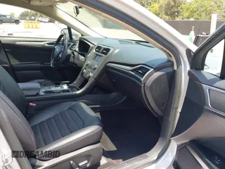 2017 Ford Fusion Hybrid SE с VIN 3FA6P0LU5HR285381, выставлен на аукционе IAAI как лот 42597789 с пробегом 129 662 миль миль и . История ставок и продаж доступна на DreamBid. Изображение 5.