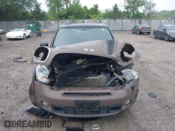 2014 MINI Countryman S with VIN WMWZC5C55EWP41717, listed as a IAAI auction lot 42324347 with Not provided miles and . Bid and sale history available at DreamBid. Image 6.