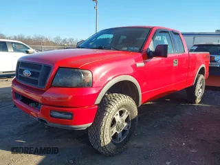 2004 Ford F-150 XLT with VIN 1FTPX14524NA28252, listed as a IAAI auction lot 41753719 with 165,179 mi miles. Bid and sale history available at carsss.com. Image 2.