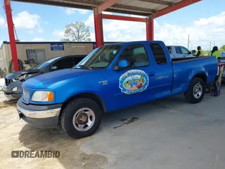 1999 Ford F-150 XL with VIN 1FTRX17L9XNB83680, listed as a IAAI auction lot 42636807 with Not provided miles and . Bid and sale history available at DreamBid. Image 17.