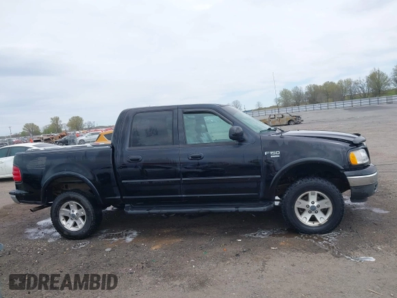 2002 Ford F-150 XLT with VIN 1FTRW08L32KD90202, listed as a IAAI auction lot 41850546 with 256,807 mi miles. Bid and sale history available at carsss.com. Image 13.