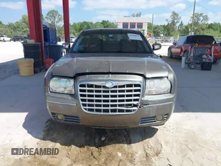 2010 Chrysler 300 Touring with VIN 2C3CA5CV5AH233033, listed as a IAAI auction lot 42130676 with 158,323 mi miles and . Bid and sale history available at DreamBid. Image 12.