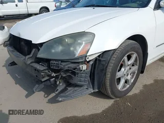 2005 Nissan Altima S z VIN 1N4AL11D25C301027, wystawiony jako IAAI lot #42349365 z przebiegiem 191 593 mil mil oraz . Historia ofert i sprzedaży dostępna na DreamBid. Obrazek 14.