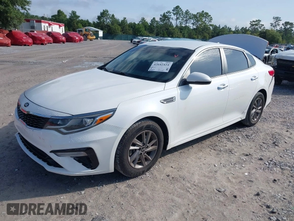 2020 Kia Optima LX with VIN 5XXGT4L30LG390927, listed as a IAAI auction lot 42642424 with 84,697 mi miles and . Bid and sale history available at DreamBid. Image 2.