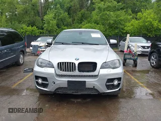2012 BMW X6 50i z VIN 5UXFG8C58CL590171, wystawiony jako IAAI lot #42357805 z przebiegiem 83 144 mil mil oraz . Historia ofert i sprzedaży dostępna na DreamBid. Obrazek 13.