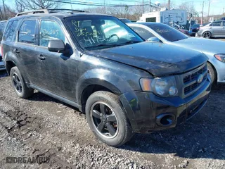 2009 Ford Escape XLT with VIN 1FMCU93G59KB55025, listed as a IAAI auction lot 41756362 with 999,999 mi miles. Bid and sale history available at carsss.com. Image 1.