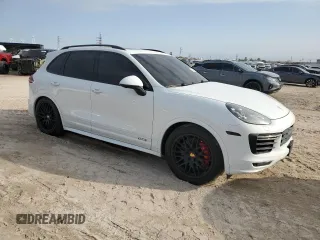 2017 Porsche Cayenne GTS with VIN WP1AD2A29HLA83277, listed as a Copart auction lot 88704975 with 47,838 mi miles and Salvage title. Bid and sale history available at DreamBid. Image 4.