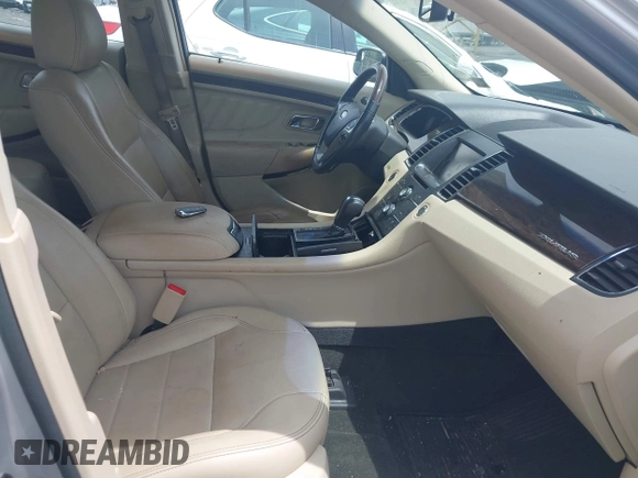 2014 Ford Taurus Limited with VIN 1FAHP2F82EG132673, listed as a IAAI auction lot 42669016 with 125,567 mi miles and . Bid and sale history available at DreamBid. Image 5.