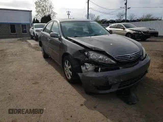 2006 Toyota Camry LE z VIN 4T1BF30K46U628070, wystawiony jako Copart lot #54582755 z przebiegiem 278 805 mil mil oraz Szkoda całkowita • Salvage title. Historia ofert i sprzedaży dostępna na DreamBid. Obrazek 14.