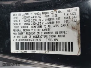 2005 Honda CR-V LX with VIN JHLRD68565C016677, listed as a IAAI auction lot 41570773 with 192,932 mi miles. Bid and sale history available at carsss.com. Image 9.