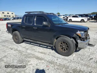 2005 Nissan Frontier LE z VIN 1N6AD07U95C401972, wystawiony jako Copart lot #48394485 z przebiegiem 302 912 mil mil oraz Szkoda całkowita • Salvage title. Historia ofert i sprzedaży dostępna na DreamBid. Obrazek 4.