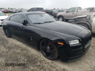 2014 Rolls-Royce Wraith z VIN SCA665C5XEUX84336, wystawiony jako Copart lot #73181343 z przebiegiem 34 367 mil mil oraz Szkody całkowita. Historia ofert i sprzedaży dostępna na DreamBid. Obrazek 4.