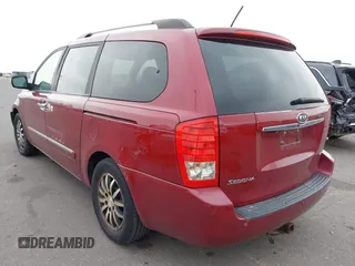 2012 Kia Sedona EX with VIN KNDMH4C76C6463143, listed as a IAAI auction lot 41990970 with 214,045 mi miles. Bid and sale history available at carsss.com. Image 3.