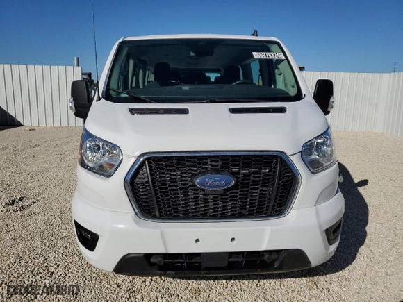 2021 Ford Transit Passenger Wagon XL with VIN 1FBAX2Y82MKA49334, listed as a Copart auction lot 86978324 with 81,468 mi miles and Clean Title. Bid and sale history available at carsss.com. Image 5.